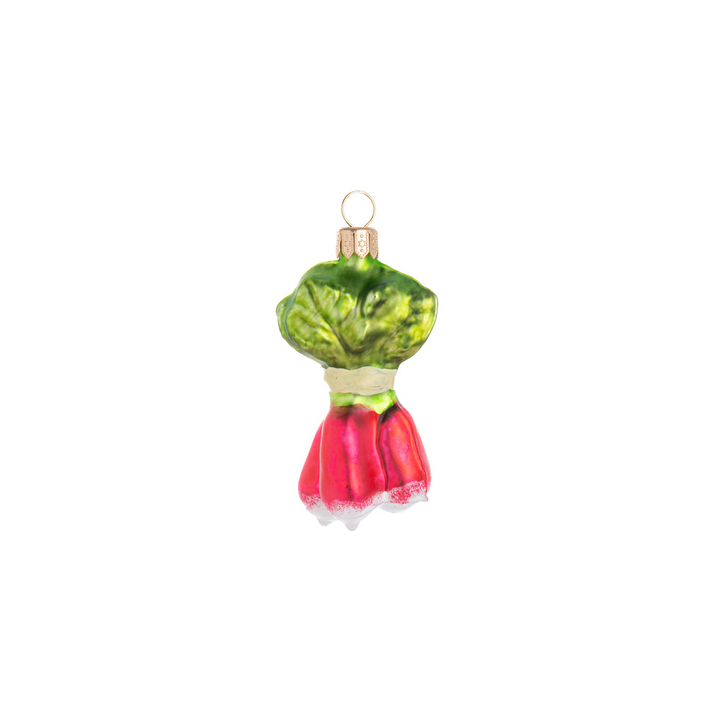 This radical root vegetable is adorable in its enchanted ornament form. Hand crafted and painted, this Enchanted Radish ornament with its bright green and pink colors is a great addition to your home and holiday decor. Hand painted glass ornament Dimensions: 3" x 1.5"