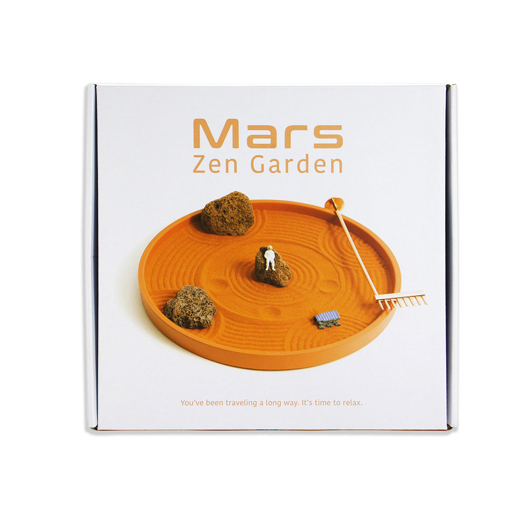 Mission Control, we’ve achieved mindfulness! Use this Mars Zen Garden to unwind and lose yourself on the tranquil Martian surface. This Zen garden features a resin tray, a bag of red sand, four lava rocks, an astronaut figurine, a Martian rover, and a copper-finish rake tool. Dimensions: 10" diameter x 2" tall.