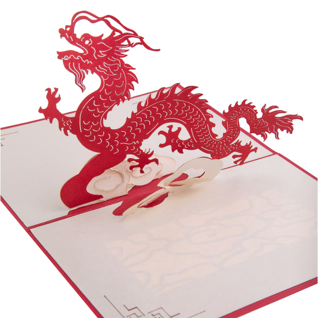 Perfect as a New Year's note, or to house money or a gift-card. Elegant and understated on the outside, this delightful note card reveals a lucky red 3D pop-up dragon on the inside. Pop-up notecard Blank inside for your own message. Dimensions: 3.75" x 6".