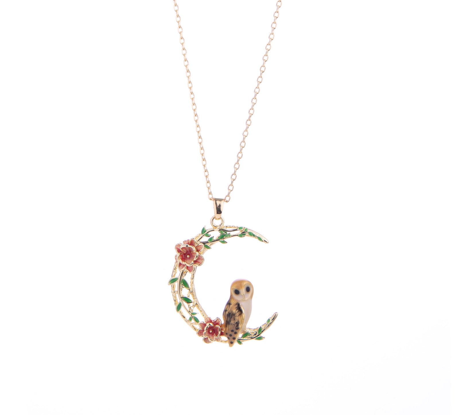 This owl perches on a 18ct gold-plated moon adorned with enamel flowers. Even though this owl enjoys nocturnal activities, this necklace is enchanting for day or night. Material: 18ct Gold-plated Brass, Enamel Dimensions: Chain Length - Approx. 18" plus 2" extender, Pendant - Approx. 1" x 1.2" Lobster claw fastening