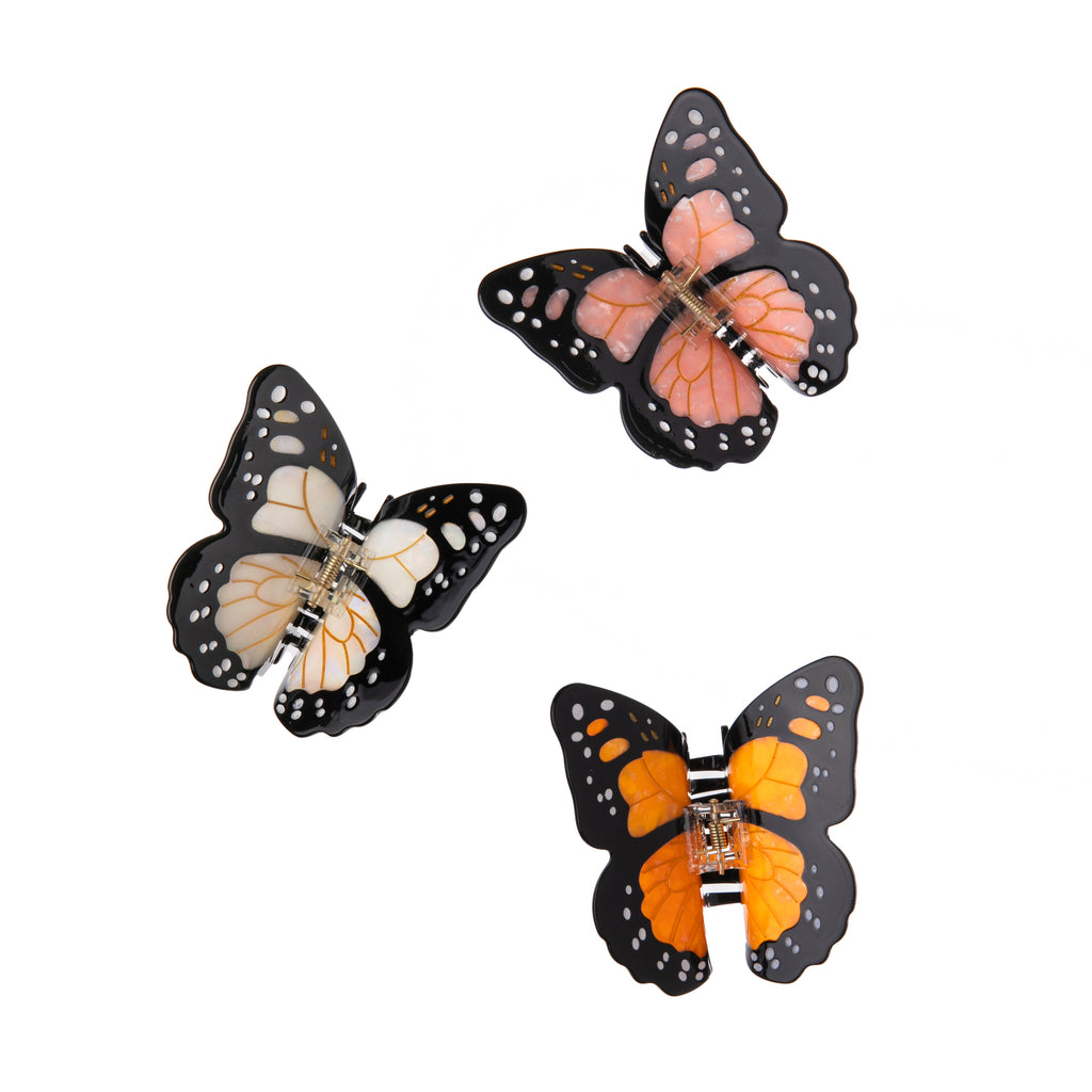 Clip up your hair in the prettiest of ways with this Monarch Butterfly hair clip. It is double sided for a perfect look from every angle. These small-batch styles are made from a biodegradable wood pulp acetate, making these clips both beautiful and kind to the environment! Size: 3.75" x 2.25".