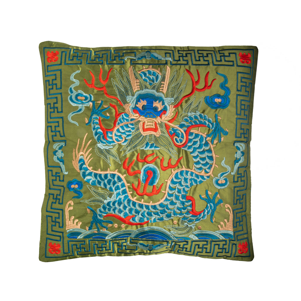 2024 is the Year of the Dragon, and how better to celebrate than with this sumptuously embroidered emerald green silk-satin throw pillow. This elegant and luxurious design will add a touch of Chinoiserie elegance to any corner of your home. Material: Silk-satin with embroidery. Dimensions: 18" x 18" Limited edition