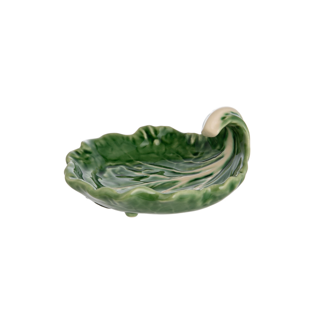 Serve olives, pickles, or sauces with a smile with this whimsical cabbage leaf dish. This delightful dish is made by master ceramics atelier Bordallo Pinheiro, which was founded in Caldas da Rainha, Portugal, in 1884. Can also be used as the cutest trinket tray. Handmade. Limited edition. Dimensions: 4.5" x 4" x 1".