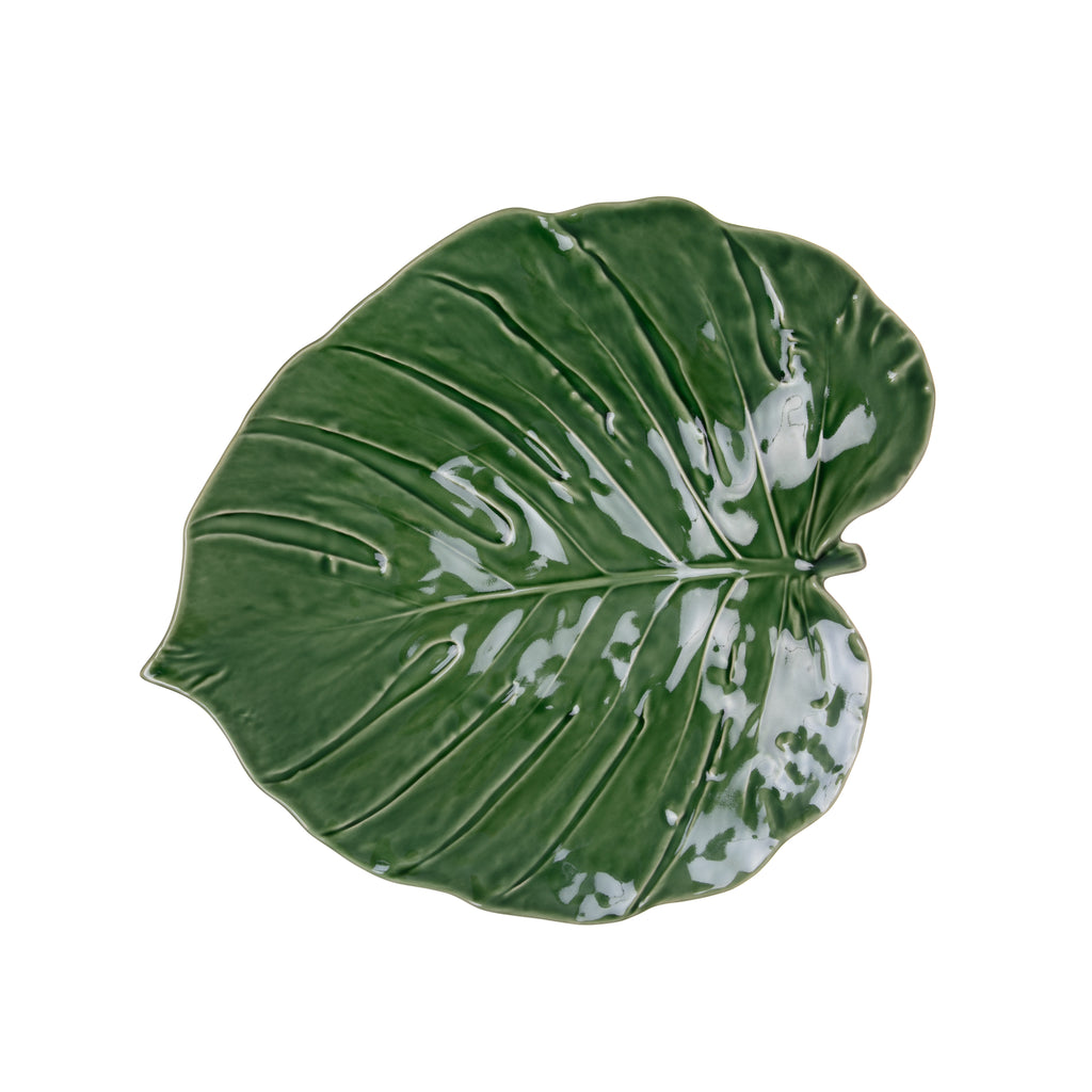 Serve canapés in style with this delightful leaf-shaped platter. This perfect platter is made by master ceramics atelier Bordallo Pinheiro, which was founded in Caldas da Rainha, Portugal, in 1884. Use as a serving dish, table centerpiece, as the base for a striking charcuterie board, and more! 17" x 15" x 2.75"