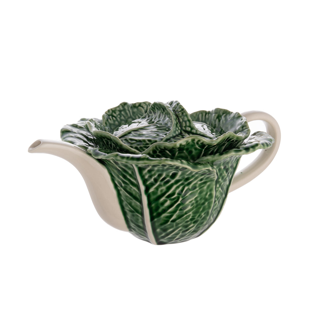 Add a dose of humor to your afternoon tea with this delightful cabbage-leaf shaped teapot. This wonderfully whimsical teapot is made by master ceramics atelier Bordallo Pinheiro, which was founded in Caldas da Rainha, Portugal, in 1884. Handmade. Dimensions: 12.4" x 8.5" x 6". * Matching cup & saucer available.