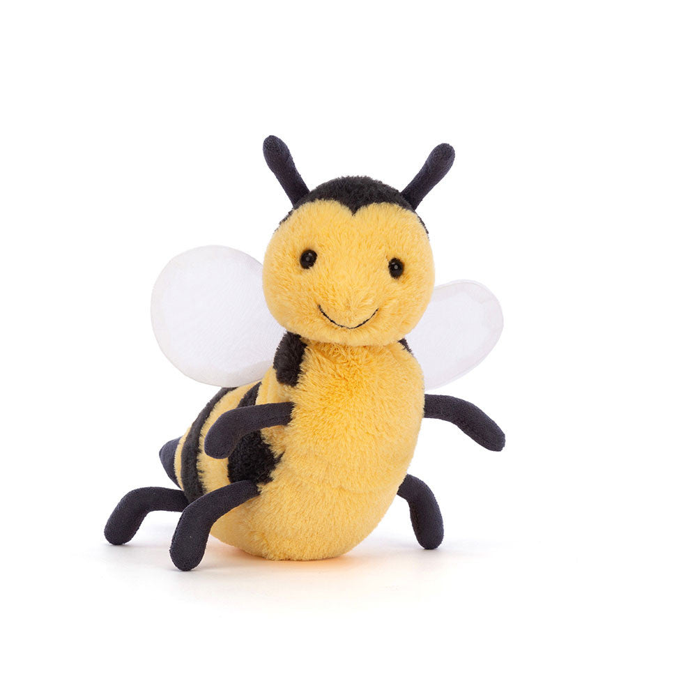 For the bee lover in your life, the sweet Brynlee Bee waves all six legs to say hello! This joyful bee has a heart-shaped face, suedette antennae and fine mesh wings, and is weighted to sit up. A striped pal in charcoal and gold, Brynlee's a brilliant nectar collector! Dimensions: approx. 5" x 2.4" x 6" 