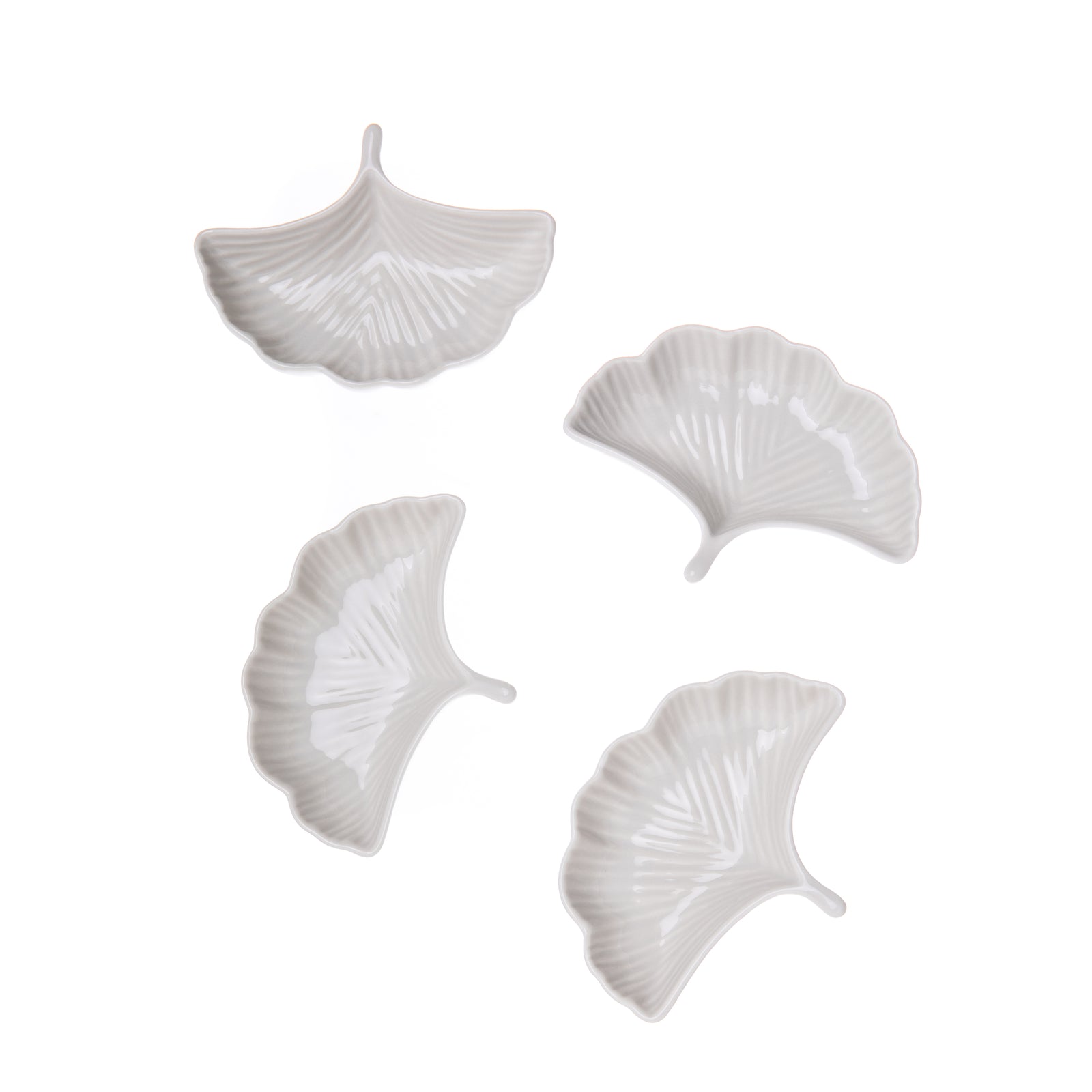 These Ginkgo dipping dishes make a perfect dish for serving dips, snacks, candy, or just as a catch-all!  In 100% stoneware and an oyster color, they are elegant and practical. The fan-shaped leaves of the Ginkgo make for a very eye-pleasing dish to use daily!  Dimensions: 4.5" x 3.5" x 1" Material: 100% Stoneware