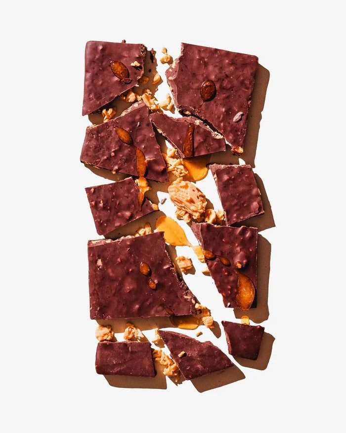 A gourmet honeycomb treat laced with tons of pieces of homemade honeycomb candy throughout and Hawaiian honey in a sweet dark chocolate bar. Dark Chocolate (Cocoa Mass, Sugar, Cocoa Butter, Soy Lecithin as an Emulsifier, Vanilla), Honeycomb (Sugar, Corn Syrup, Molasses, Salt) 