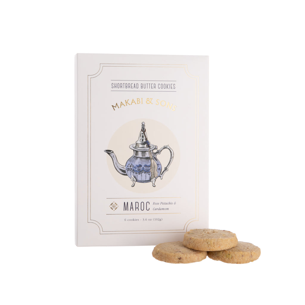 These delectable shortbread butter cookies offer a taste of Berber city life with roasted pistachio, fragrant rosewater, and aromatic cardamom. Ingredients: enriched flour, butter, sugar, pistachio, cardamom, dried rose, rose water, natural flavor, salt Box contains six cookies (3.6 oz.).