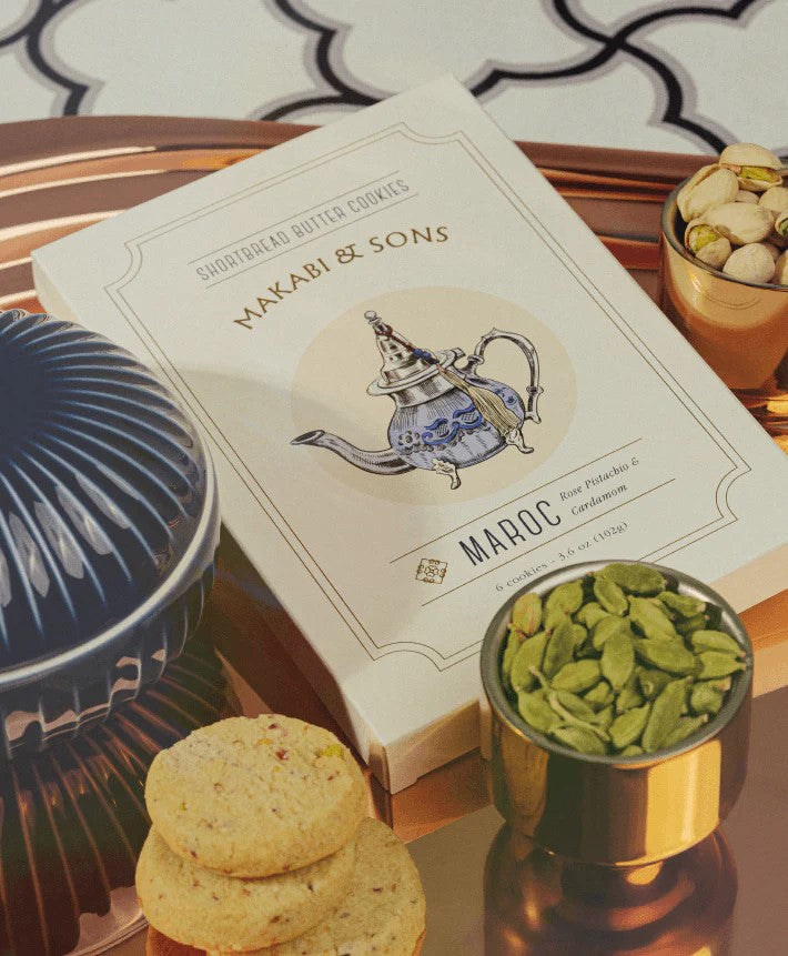 These delectable shortbread butter cookies offer a taste of Berber city life with roasted pistachio, fragrant rosewater, and aromatic cardamom. Ingredients: enriched flour, butter, sugar, pistachio, cardamom, dried rose, rose water, natural flavor, salt Box contains six cookies (3.6 oz.).