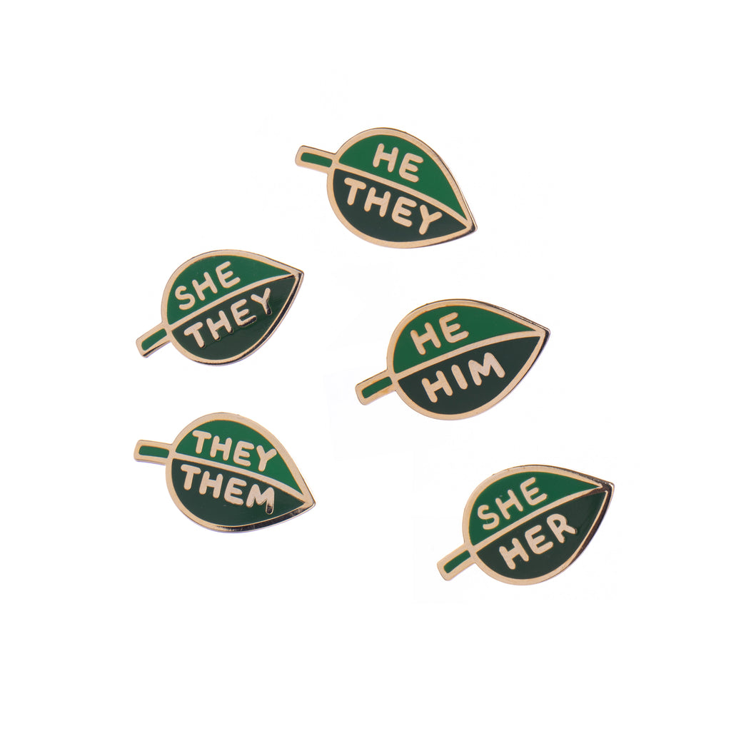 This two-tone enamel leaf pronoun pin allows you to communicate your preferred pronouns in a cute and subtle way. Pin to lapels, backpacks, sneakers and more! Materials: metal and enamel Pin fastening with rubber stopper Dimensions: 1" x 1.5"