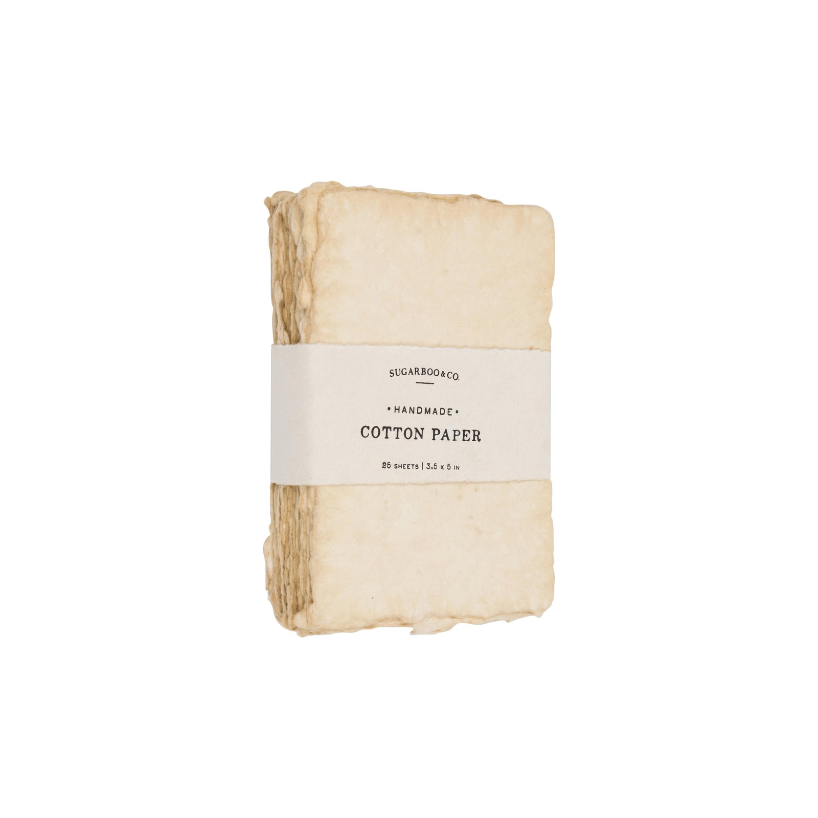 Folded cotton paper with a label on a white background