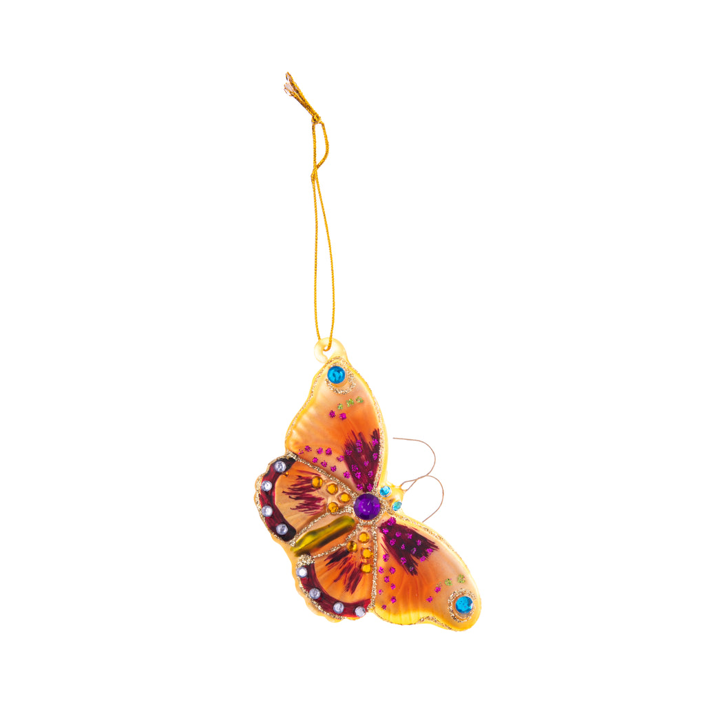 Add some natural charm with the enchanting papillion ornament. This sparkly yellow butterfly is decorated with multicolor crystals and glitter, making it a perfect piece to add a lot of sparkle and color to your home and holiday decor. Dimensions: Approx. 2" L x 3.5" W Glass ornament