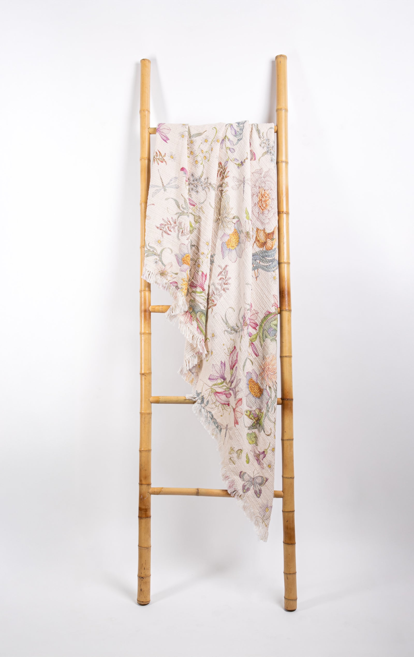 Get super cozy with this incredibly soft throw blanket, made of 100% cotton. Its multicolor pattern allows it to complement any space or color scheme—whether used in a living area or as an accent on a bed. Dimensions: approximately 53" x 67" Material: 100% cotton. OEKO-TEX certified. Made in Italy.