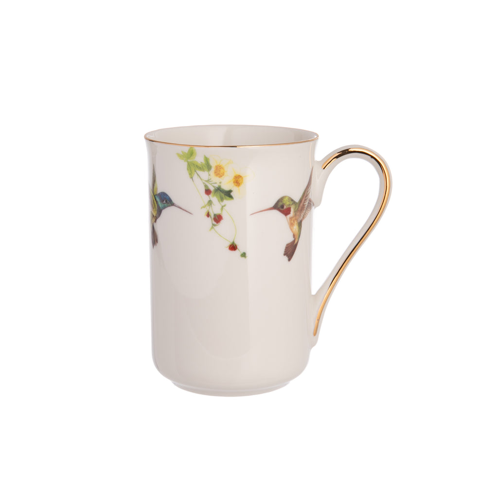 This delightful mug is made from fine bone China and is adorned with a charming hummingbird motif. It is finished with luxurious 10K gold accents, thus giving your morning coffee or afternoon tea a decidedly elegant touch. Material: Fine bone China Capacity 12 oz. Dimensions: 3" x 4.5" * Matching items available.