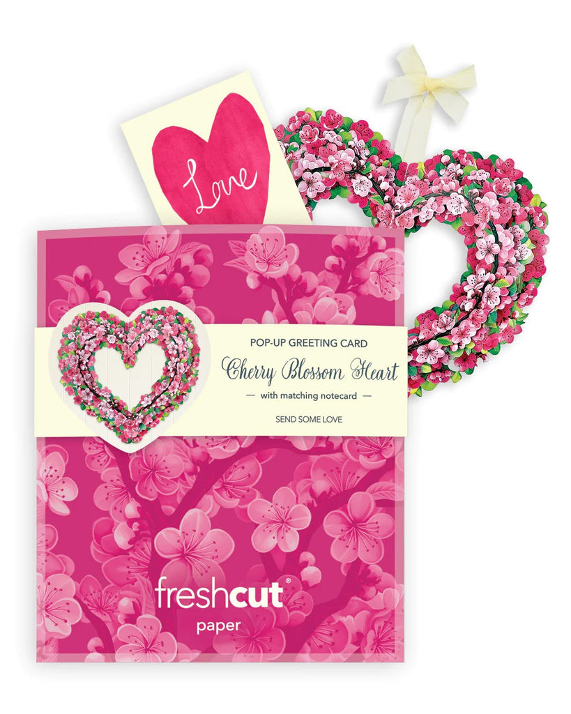 This sweet mini pop-up heart features soft pink sakura petals that can be sent as a gift so you can share the love. This charming foldable paper display will remain in bloom all year round. Measures approximately 6” high by 5" across 100% Recyclable Paper Comes with a blank 2.5" x 3.5" notecard and mailing envelope