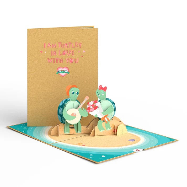 Send this love note to your sweetheart and show how much you want to shell-ebrate them with this 3D pop-up card! Adorned with two turtles enjoying their beach date, this card is perfect for an anniversary, Valentine's Day, or a simple love note. 3D Pop-up card Includes blank envelope and notecard Dimensions: 5" x 7"