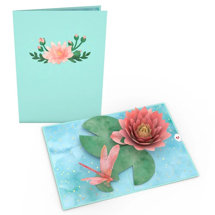 Share in joyous life events with this stunning water lily and dragonfly 3D pop-up notecard. Celebrate a happy occasion or just send a note to remind someone you care.  The water lily with gold detail and dragonfly conveys the tranquility of a pond. 3D Pop-up card Includes blank envelope and notecard Dimensions: 5" x 7"