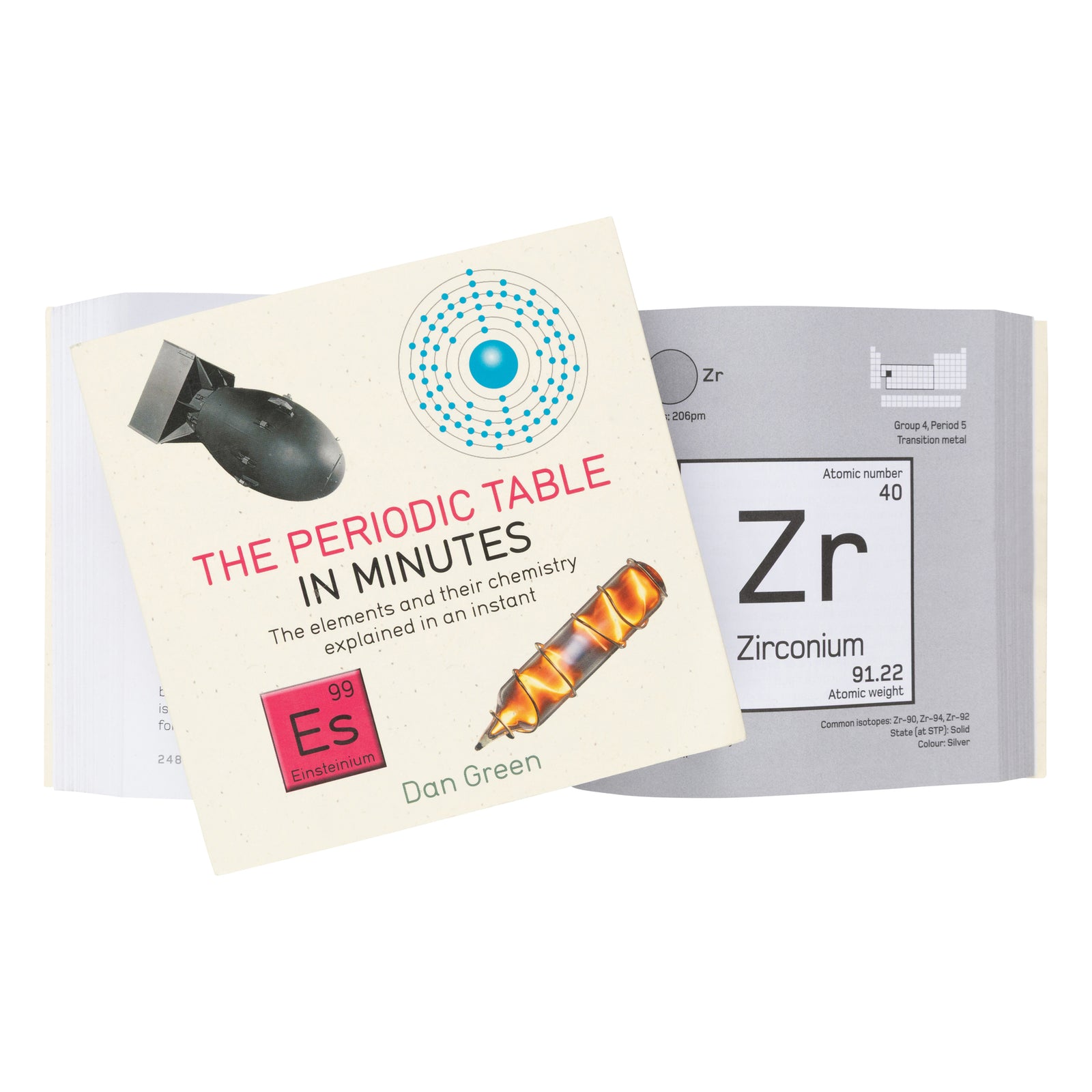 Book cover for 'The Periodic Table in Minutes' by Dan Green, featuring a bomb, an atom diagram, a pink periodic table element tile, and a stylized pencil on a light beige textured background.