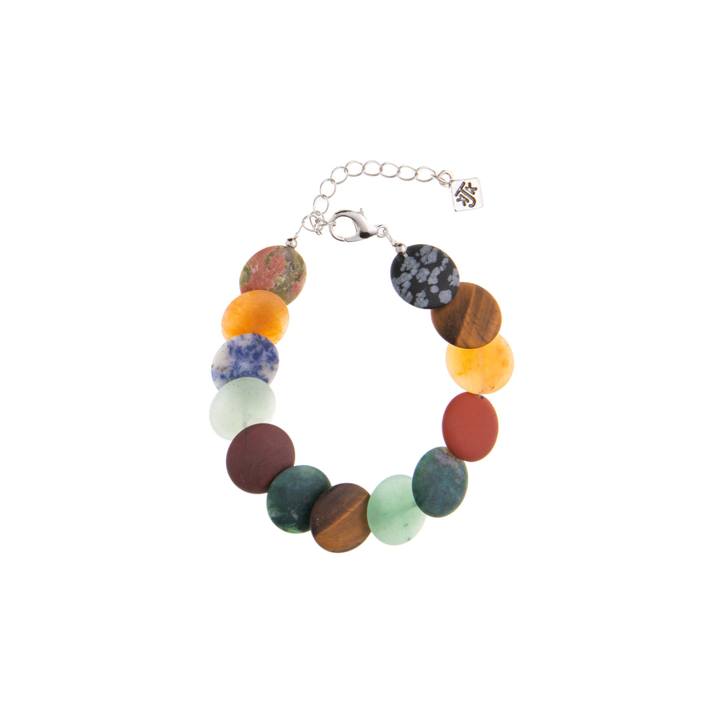 This fabulously colorful bracelet features many variations of agate discs, and also has a sterling silver lobster clasp closure with an extender chain. 