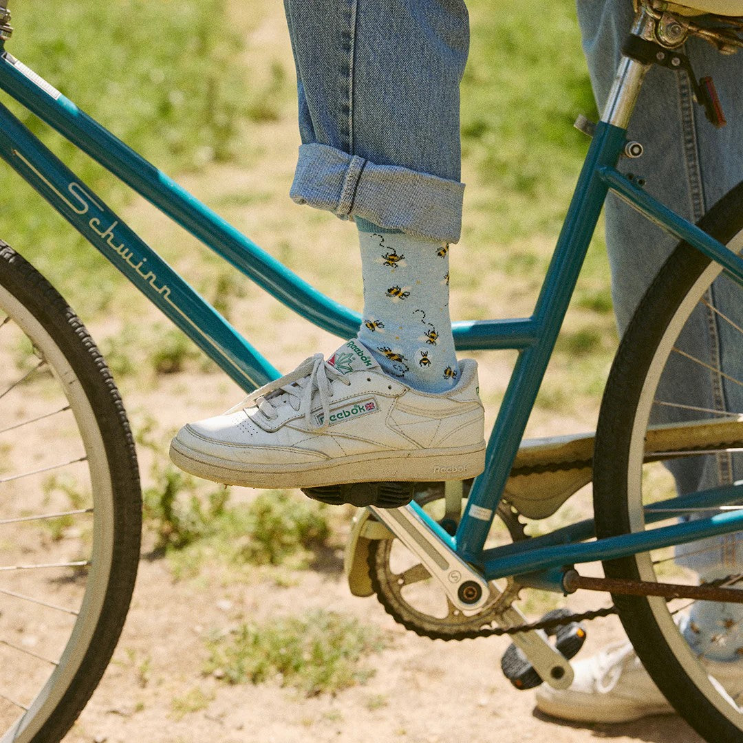 Protect our precious pollinator friends with these socks that are extremely buzzworthy. With a light blue background, bee your most authentic self with these super comfy and stylish socks. A great gift for all of the bee fanatics you know.  Fairtrade, Certified Organic Cotton Vegan Terry padding for comfort