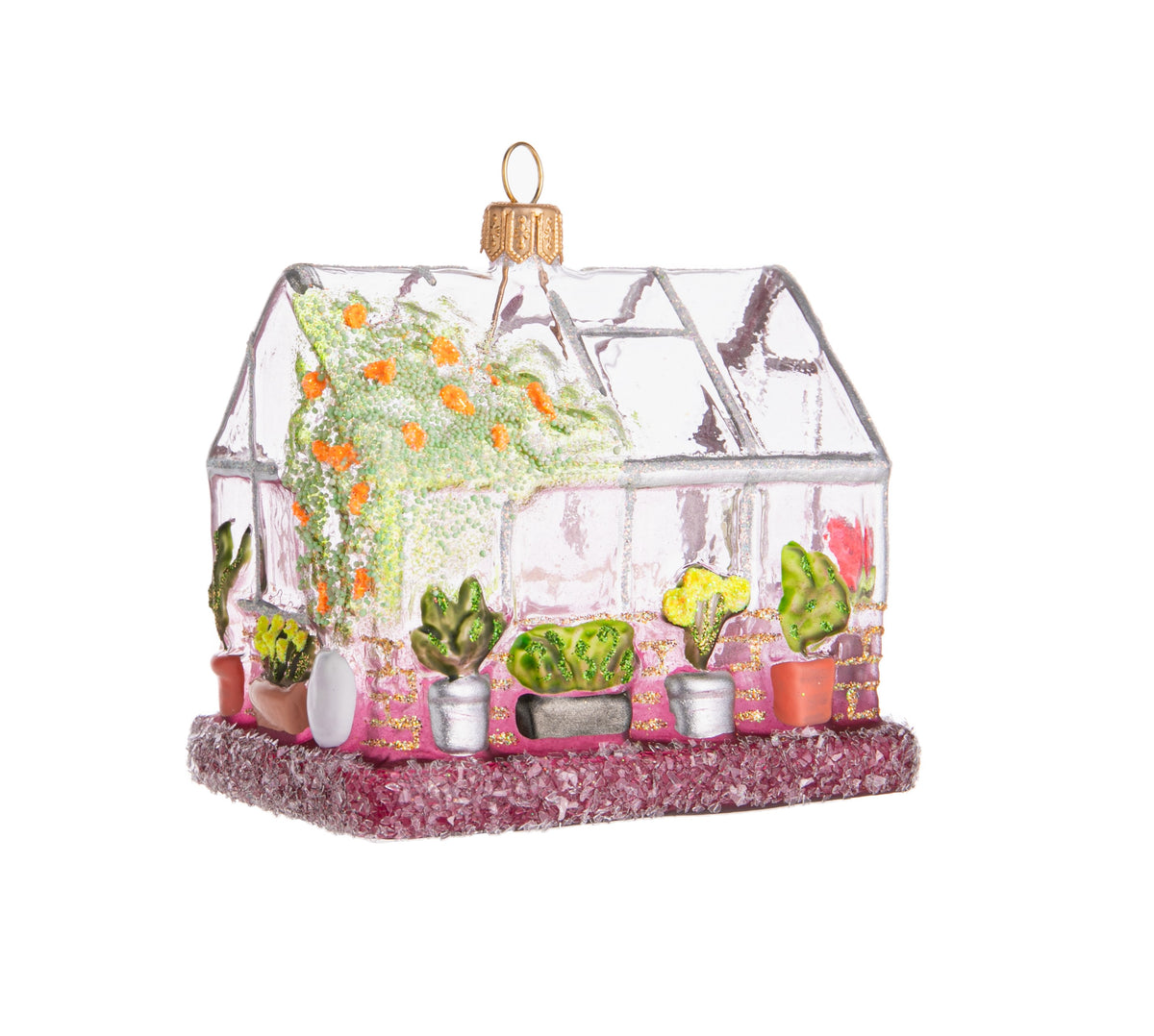 Is your greenhouse your happy place? If so, then this is the ornament for you. This handmade glass ornament features trees and potted plants outside a multi-windowed greenhouse, all topped off with plenty of light-catching sparkle! Handmade and hand glittered glass ornament. Dimensions: 3&quot; x 3.25&quot; x 2.25&quot;