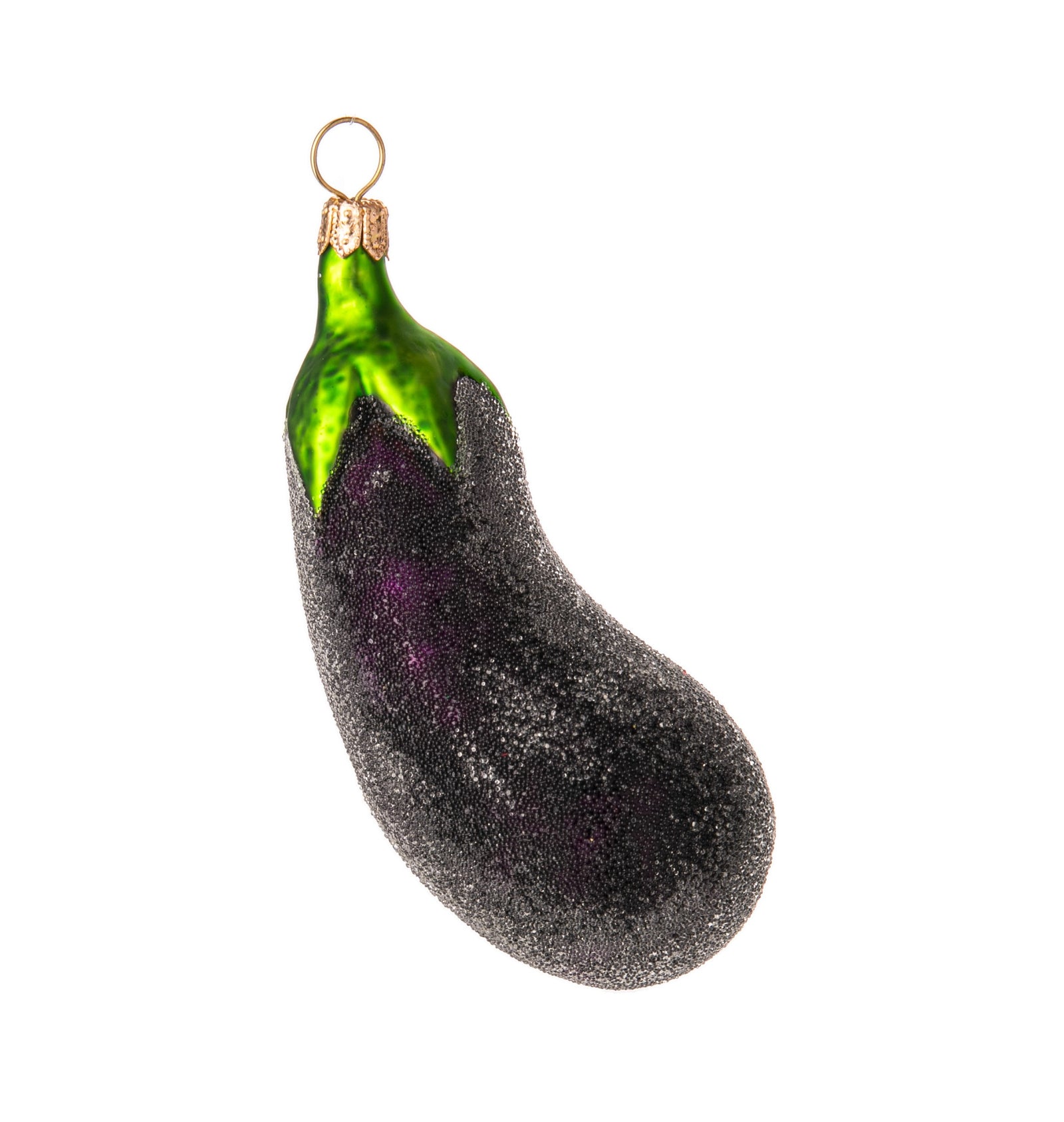 Long before the eggplant became an infamous emoji, it was a simple, unassuming and delicious vegetable. Here, it is given a glow-up with a metallic green stem and an enchanting, subtly sparkling frosting. Glass ornament. Handmade. Dimensions: 4.5" x 1.5".