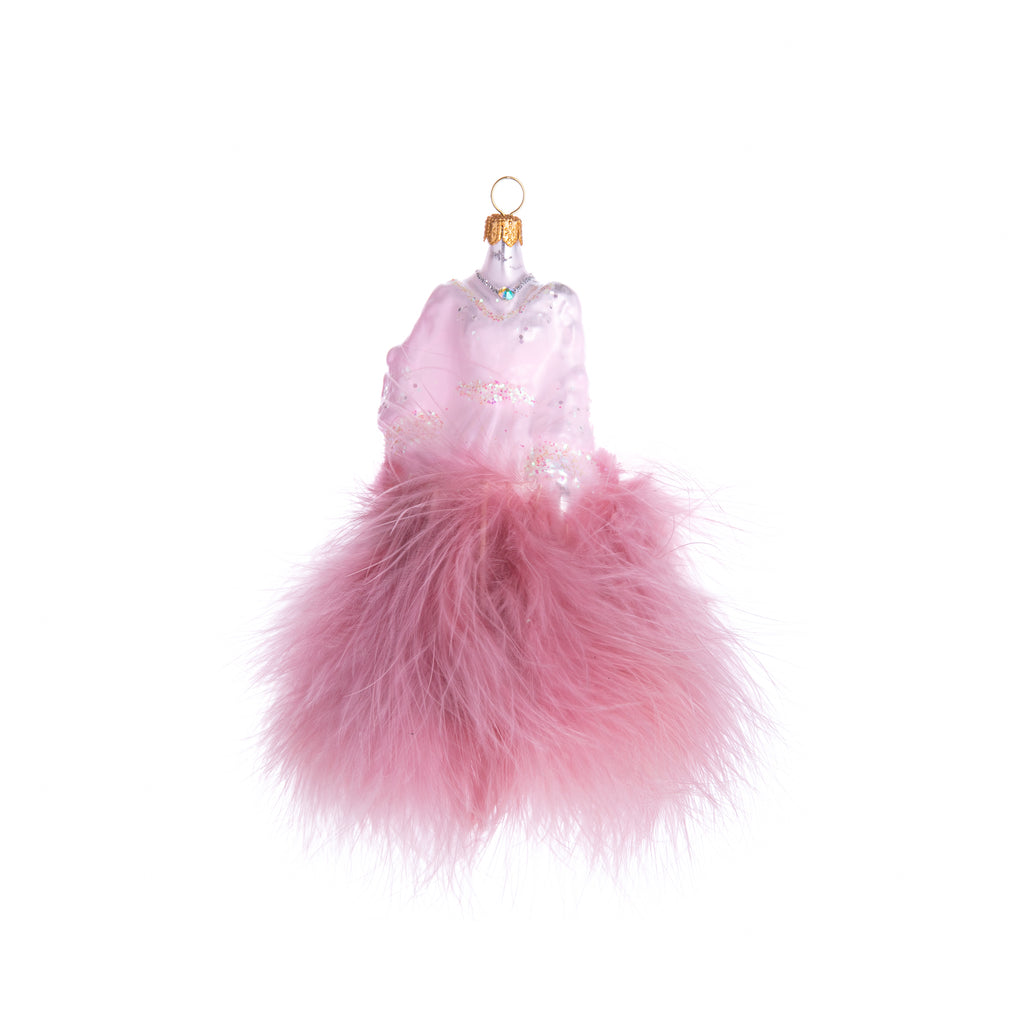 Add a little fashion to your holiday decor with this pink marabou dress ornament! Decorated with pink marabou feathers, this glass ornament features a gorgeous ball gown on a dress form. It also has glitter and crystals to finish off this sparkling, fabulous piece. Dimensions: 6.5" H 