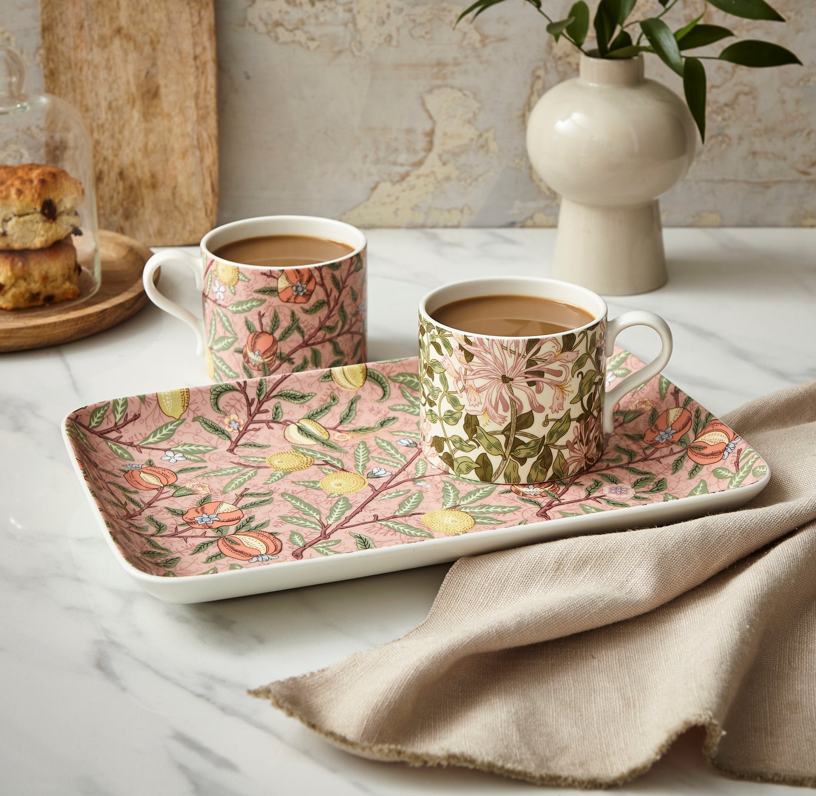 Celebrate William Morris with this ceramic serving tray with William Morris' Fruit (1886) featuring pomegranates and lemons. William Morris is regarded as one of the greatest designers of the Arts and Crafts movement. Dimensions: 12" L x 8.9" W x 1.6" D Dishwasher, microwave, oven, and freezer-safe Material: Porcelain