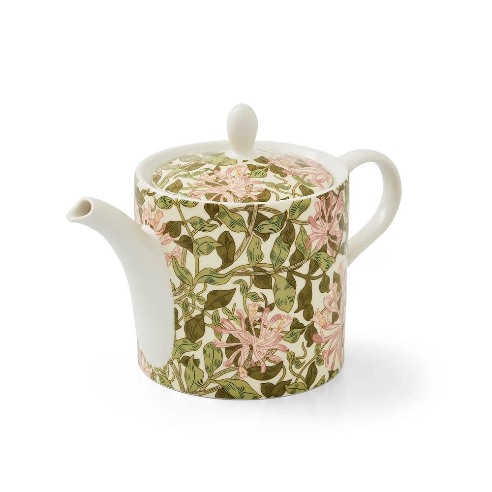 Celebrate William Morris with this ceramic teapot decorated with William Morris' Honeysuckle (1883). William Morris is regarded as one of the greatest designers of the Arts and Crafts movement. Dimensions: 9.4" W x 5" D x 6.5" H Dishwasher, microwave, oven, and freezer-safe Material: Porcelain 37 oz. Capacity