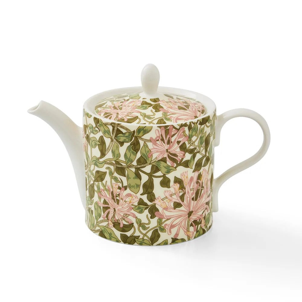 Celebrate William Morris with this ceramic teapot decorated with William Morris' Honeysuckle (1883). William Morris is regarded as one of the greatest designers of the Arts and Crafts movement. Dimensions: 9.4" W x 5" D x 6.5" H Dishwasher, microwave, oven, and freezer-safe Material: Porcelain 37 oz. Capacity