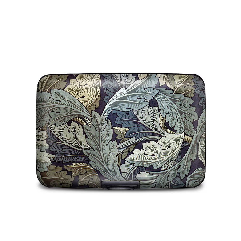 Celebrate William Morris with this armored wallet decorated with William Morris' Acanthus. Made of aluminum, this wallet offers a tear resistant fabric interior accordion. The RFID blocking technology will protect against identity theft. Dimensions: 4" x 3" x 0.75" 6 pocket divider 