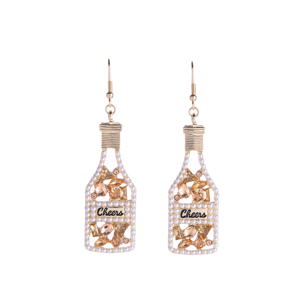 Featuring golden champagne bottles that read "CHEERS!" and have lots of faux pearl detail, imbibe in these earrings perfect for any celebration. These would make a great stocking stuffer. Dimensions: Approx. 3" Length including earring hook Material: 18k Gold-plated Brass, Faux Pearls, Crystal Accents Lead-free