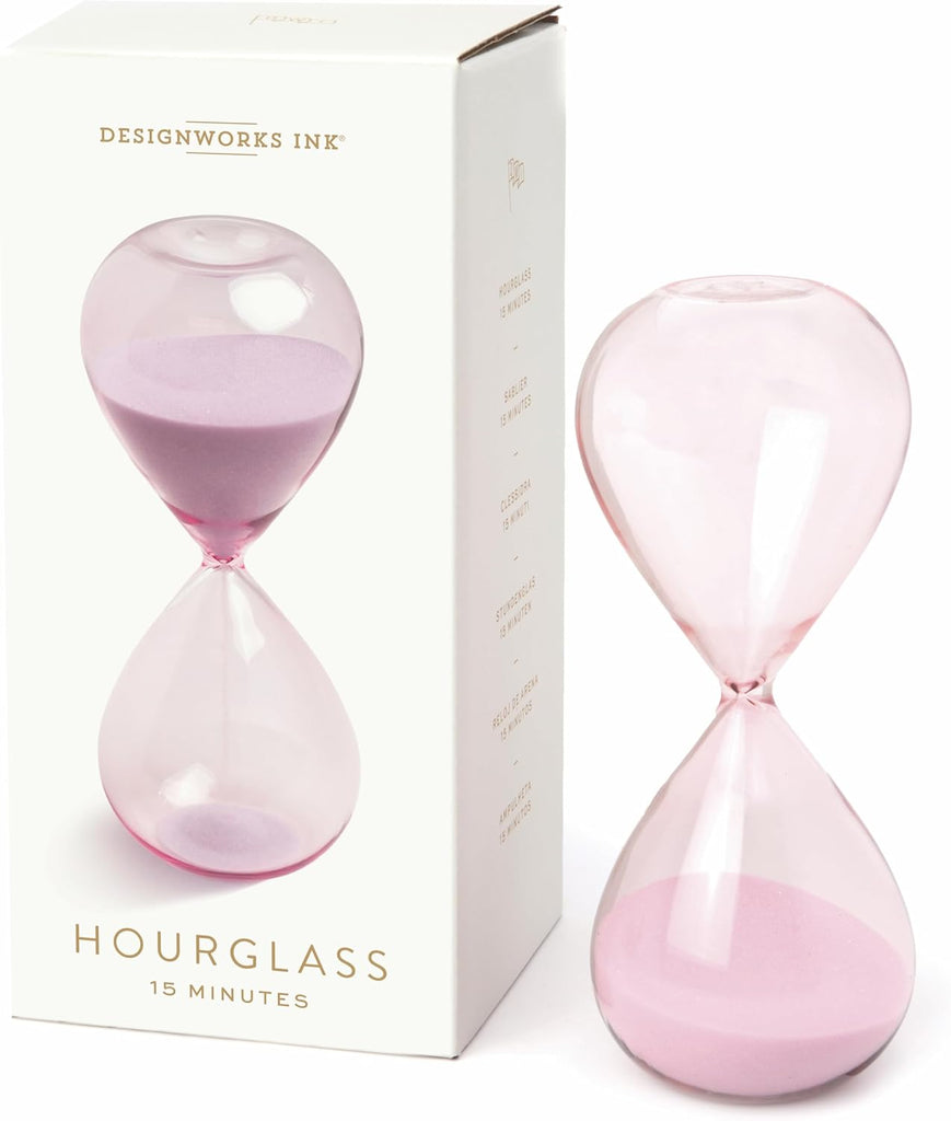 Stay on time with this hourglass that is timed for 15 minutes. You can use this hourglass for creative timeframes, or use it as a stylish addition to your desktop or bookshelf. With ombré glass and lilac sand, this hourglass is modern and can go anywhere in your home or office. Dimensions: 6.6" tall 15 minute timer