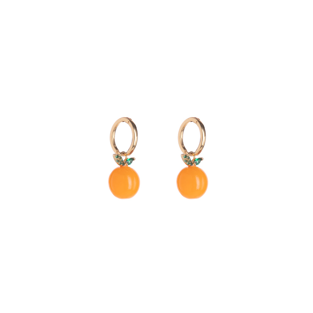 With a refreshing resin orange, these orange drop huggie earrings will bring some citrus charm to your look. And with CZ green enamel leaves, these cuties are eye-catching while bringing some subtle glam. Material: Brass, CZ, Enamel Dimensions: Approx. 1" Length, 0.4" Width Huggie hoop closure Lead and Nickel-free