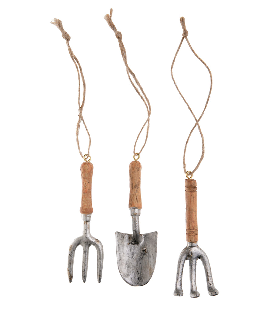 If you or someone you know loves gardening, this is the ornament set for you! Featuring three miniature life-like gardening tools.