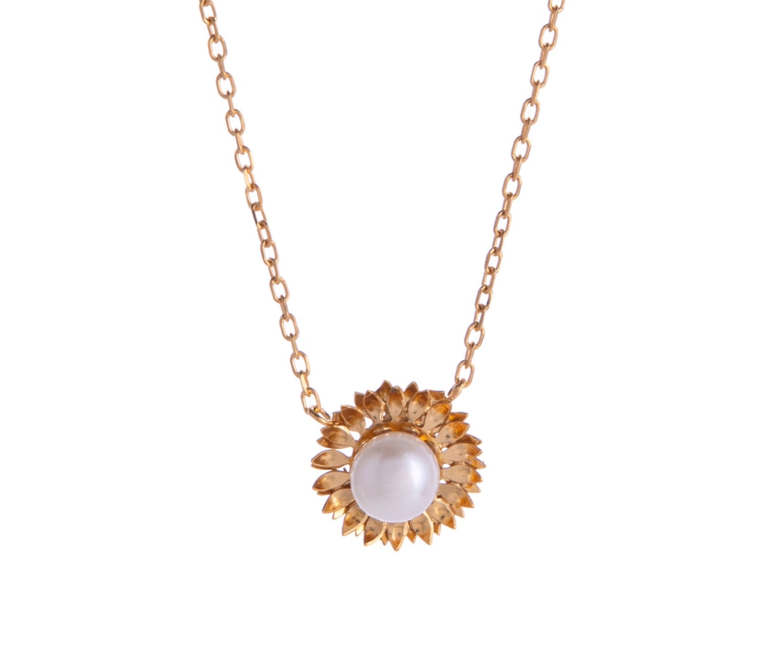 Brighten your day with a sunflower. With gold detail and a freshwater pearl, this pendant necklace will help you shine like a real sunflower.