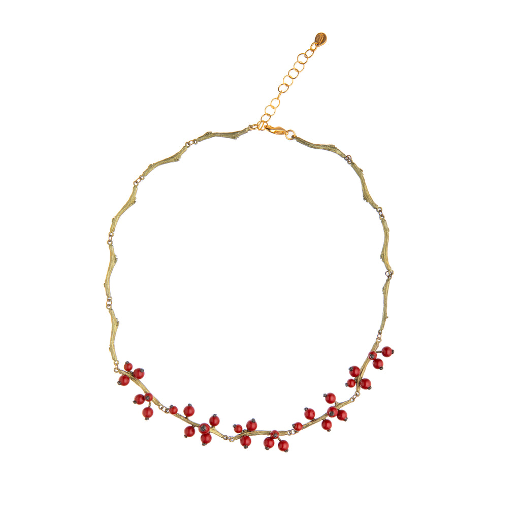 This fabulously festive necklace is cast in solid bronze with a hand-patina finish giving the 'branch' links a gorgeous vintage style finish. The holly 'berries' are made from red jade beads, each carefully added by hand.  Materials: bronze, red jade Dimensions: Chain length: 16" with 2" extender. Made in the U.S.A.