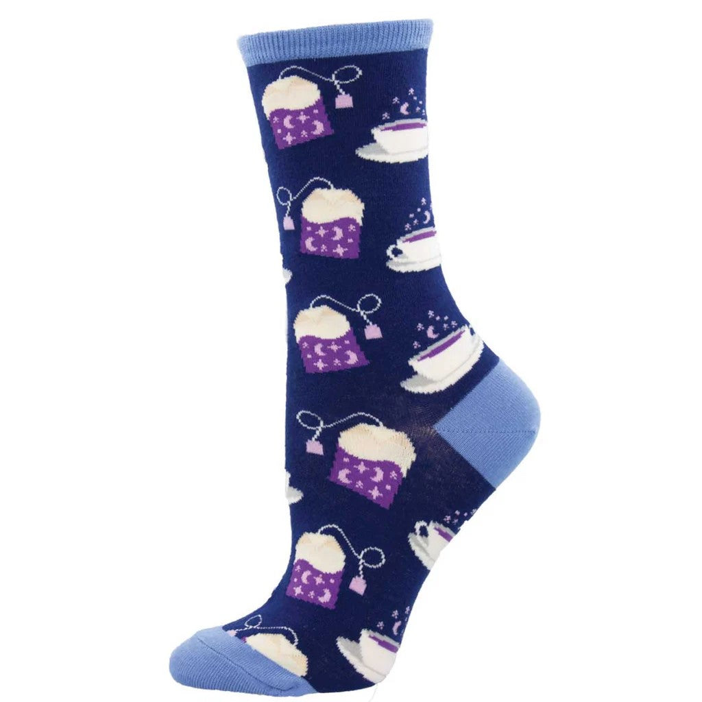 Whether you drink chamomile or earl grey, these socks featuring a tea and teabag with moon and star motifs are perfect for any time of day. With a navy blue background and a light blue toe and heel. Sizing: Fits Women's Shoe Size 5-10.5 and Men's Shoe Size 5-9 Material: 48% Cotton, 50% Nylon, 2% Spandex