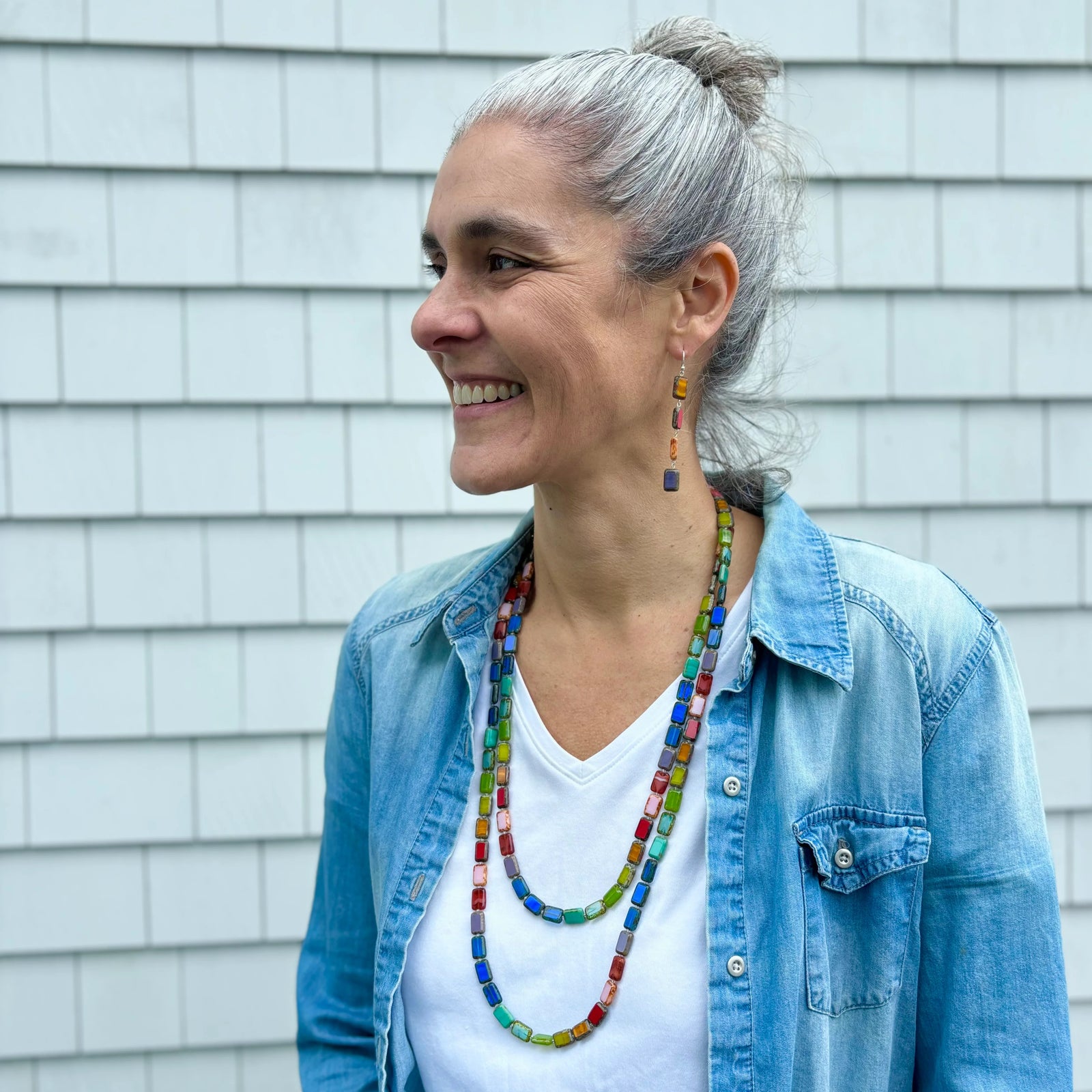 This gorgeous handmade long necklace with multicolor glass beads is a wonderful addition to any outfit as it can be paired with any color you wear and layered many different ways with its 60" strand. With a sterling silver toggle clasp. Glass beads Dimensions: 60" strand Sterling silver toggle clasp