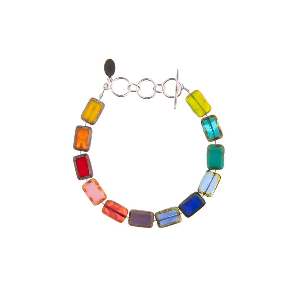 This handmade bracelet with multicolor glass beads can be paired with any color you wear. Additionally the bracelet's adjustable sterling silver toggle clasp will ensure a comfortable fit for most wrists as it can adjust from 7.25" to 8.5". Glass beads Sterling silver toggle clasp