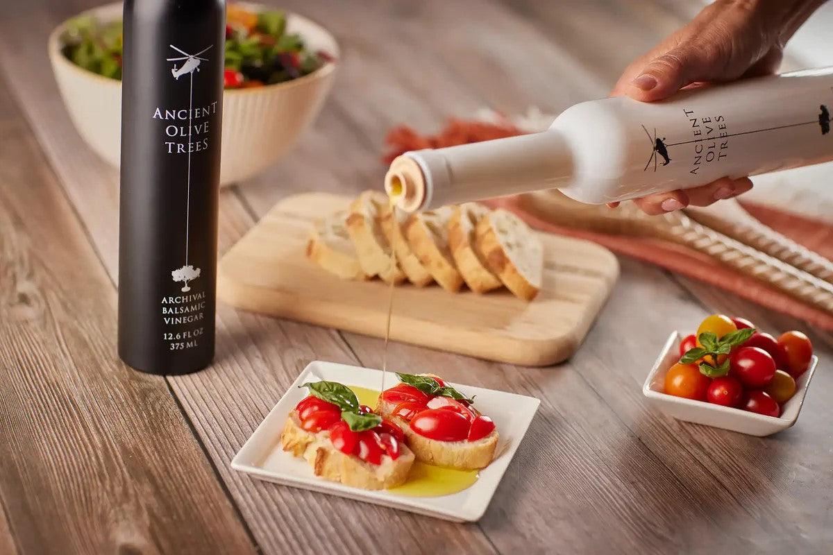This premium California extra virgin olive oil was harvested from olive trees planted in Corning, CA. The olives are pressed within hours of harvesting. The olive oil has floral notes of fresh herbs, fruit and green grass. This olive oil would make a wonderful housewarming gift. 12.6 fl. oz. Produced in California