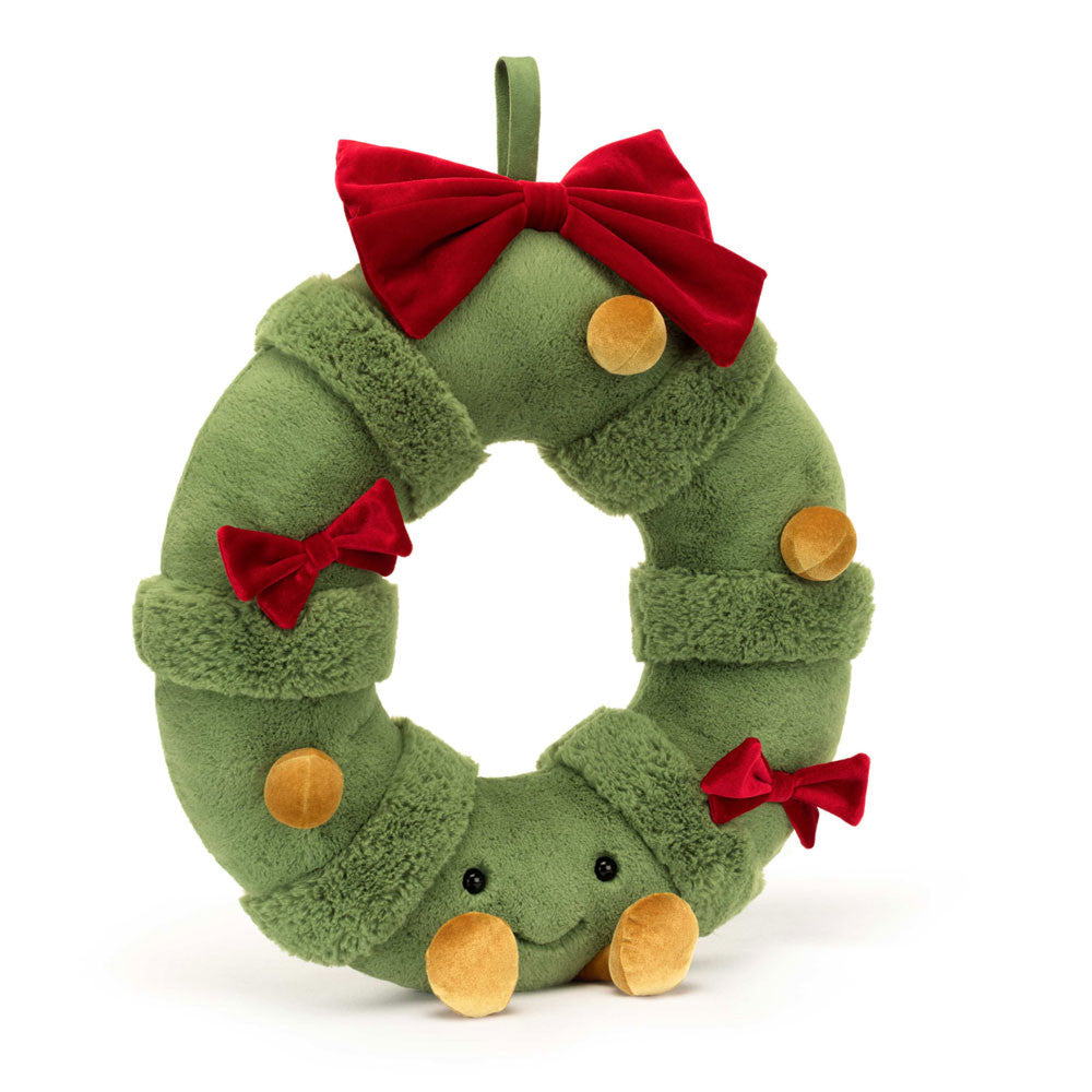 Amuseable Decorated Wreath has a suedette loop attached for hanging and greeting your guests. This wreath has green fur with textured segments, as well as gold velour baubles and boots, and velvety cranberry red bows! Dimensions: 17.3" x 14.6" x 3.5" Material: Polyester Not recommended for children under 12 months.