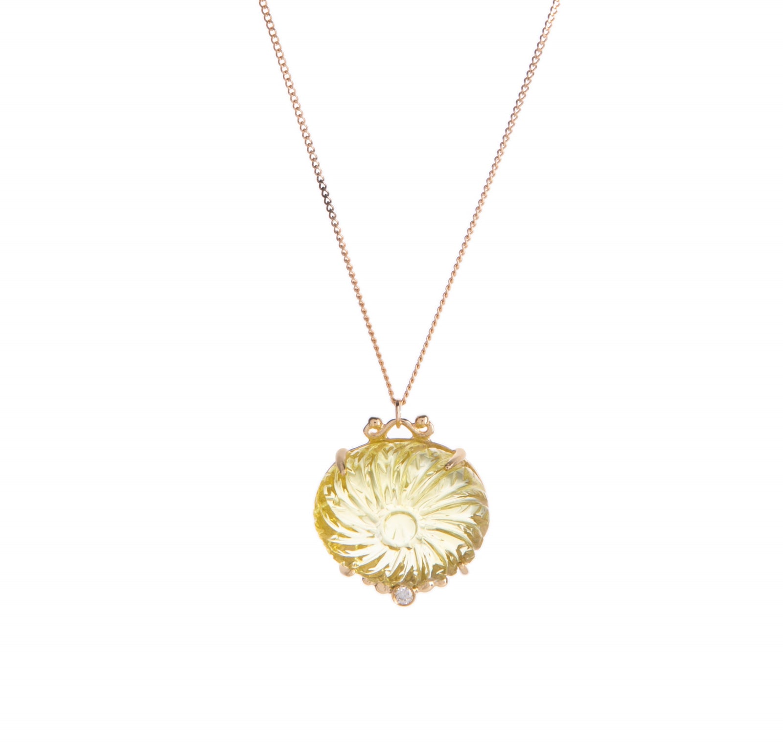 This high-quality dahlia necklace features a hand-cut dahlia that comes in either lemon topaz or amethyst, as well as a sparkling white diamond inlay. 
