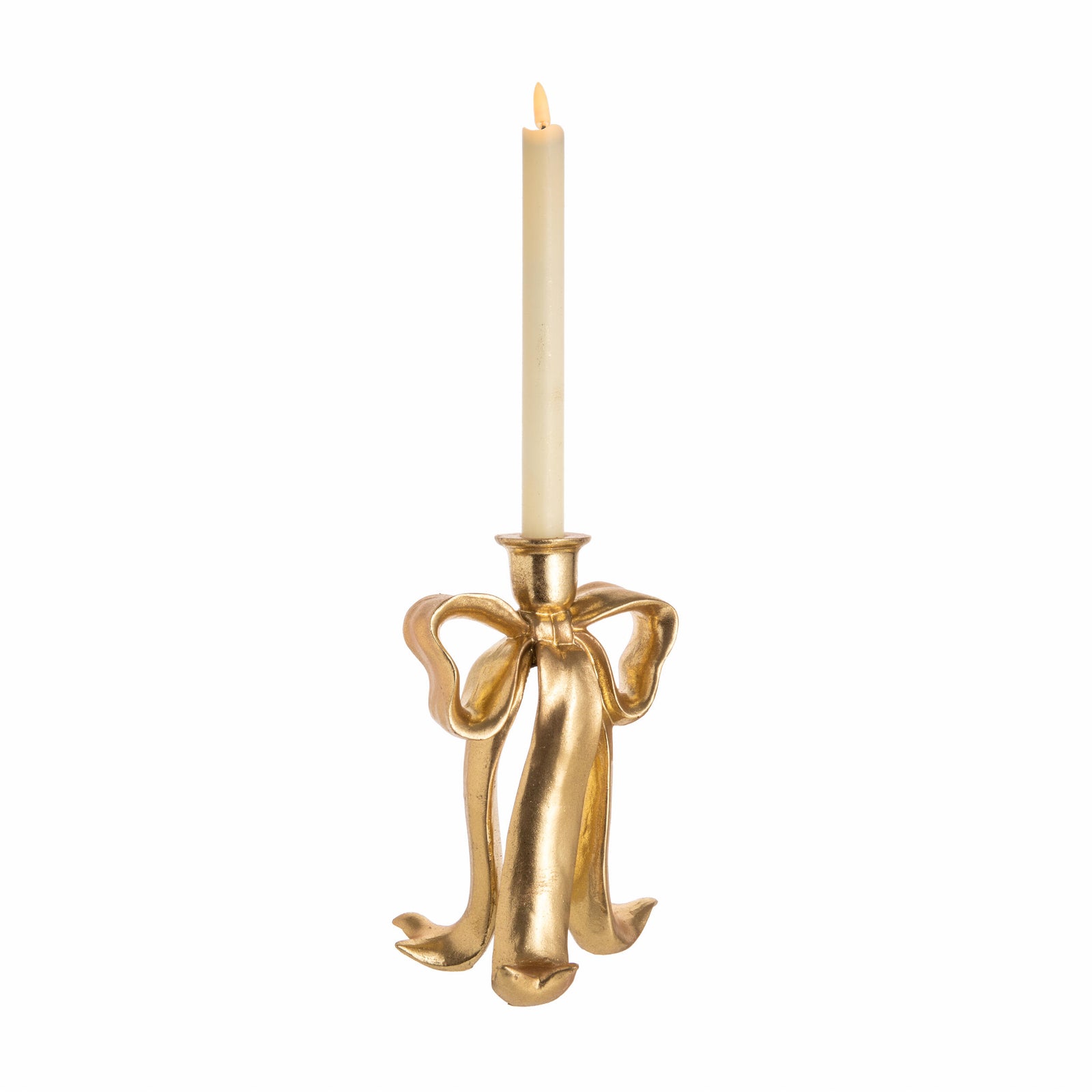 Gold bow-shaped candle holder with a candle on a white background