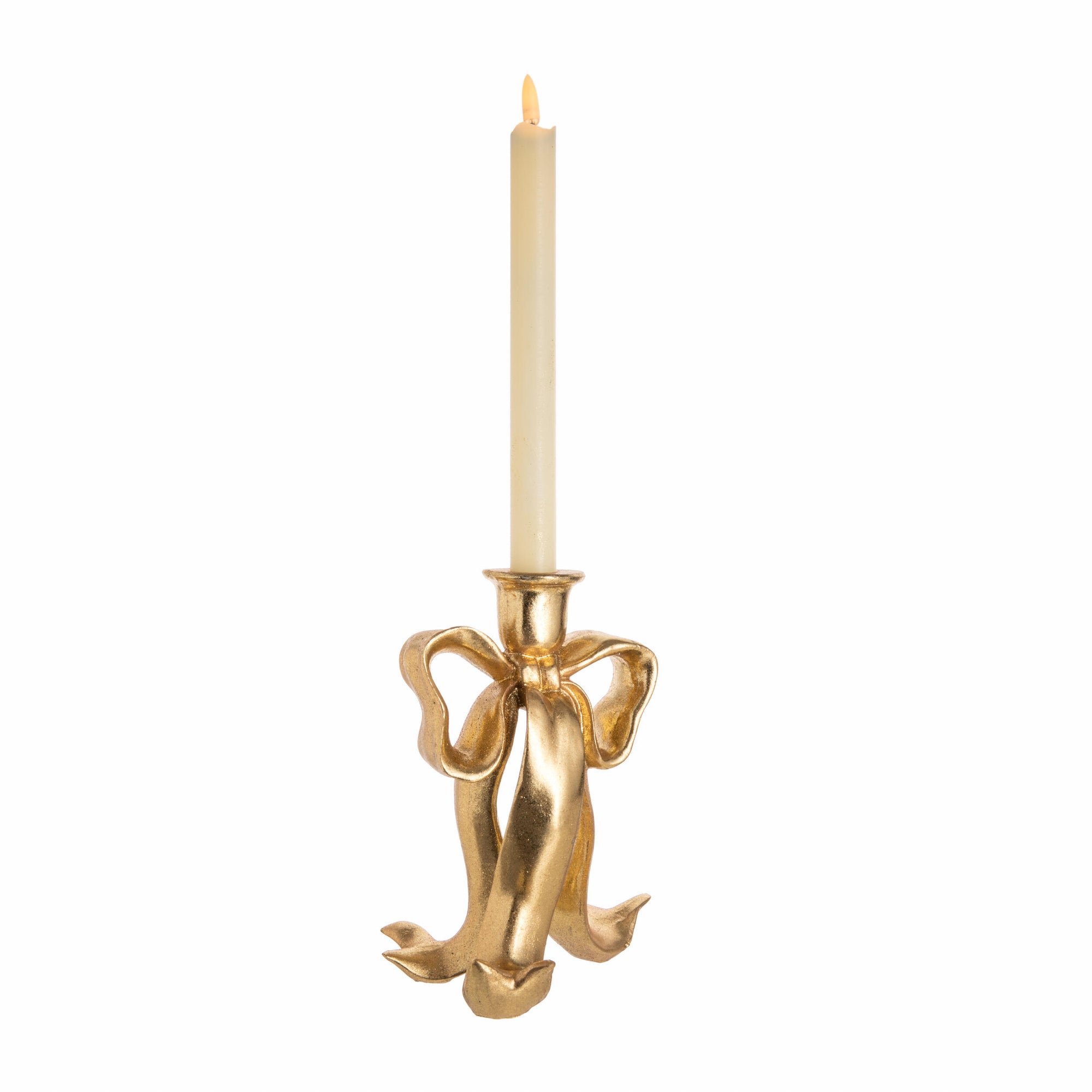 Gold bow-shaped candle holder with a candle on a white background