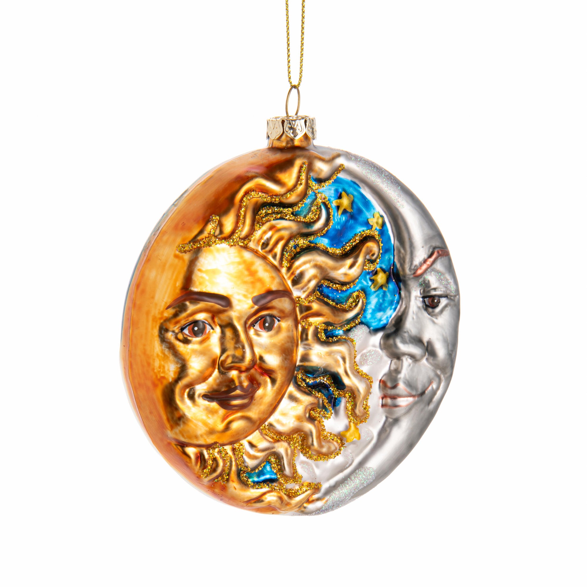 Decorative ornament with sun and moon faces on a white background