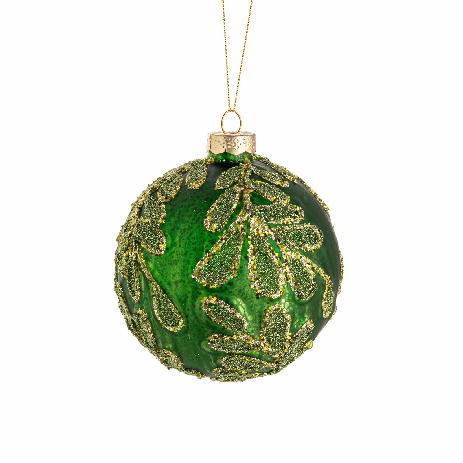 Green Christmas ornament with gold leaf patterns on a white background