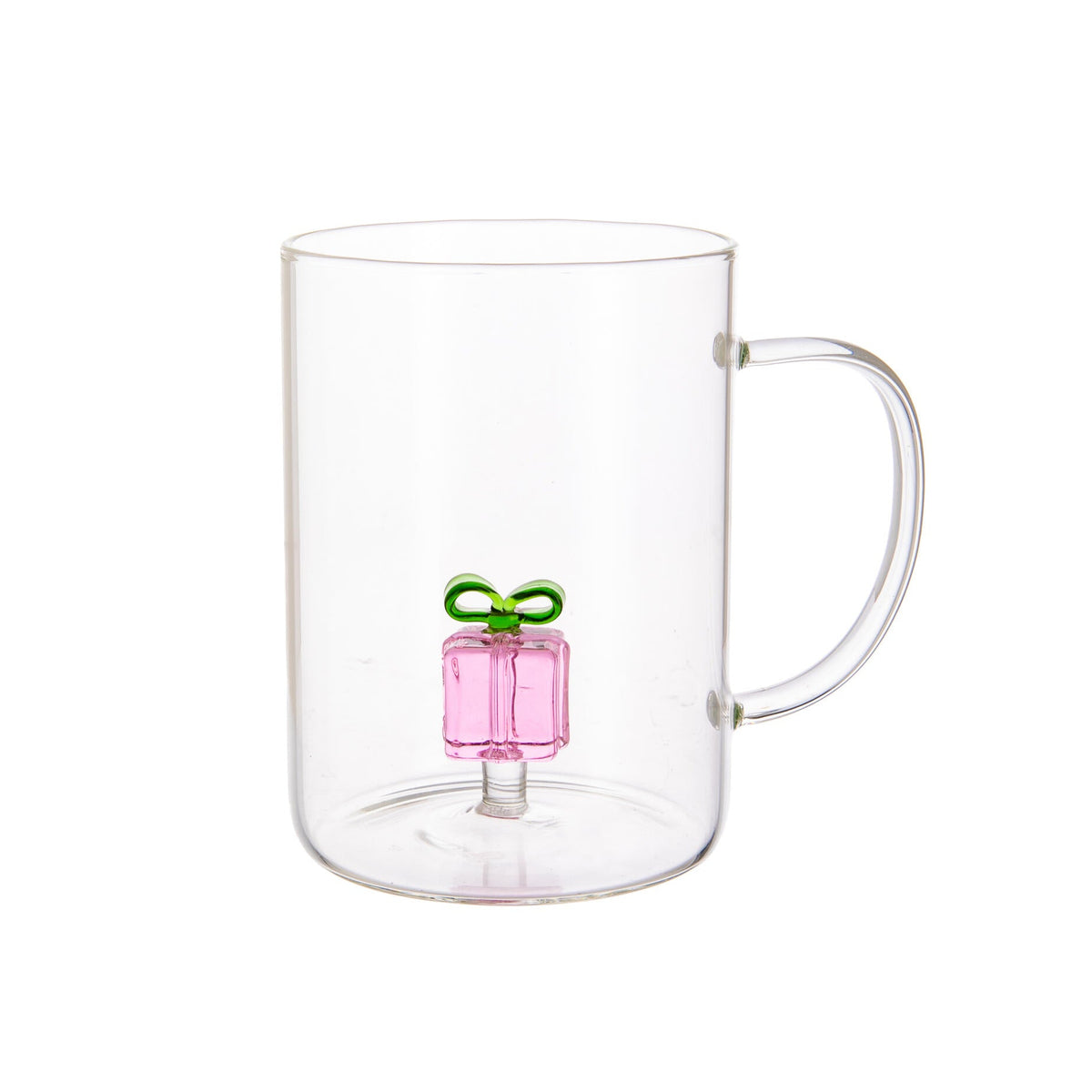 Clear glass mug with a pink glass gift inside on a white background