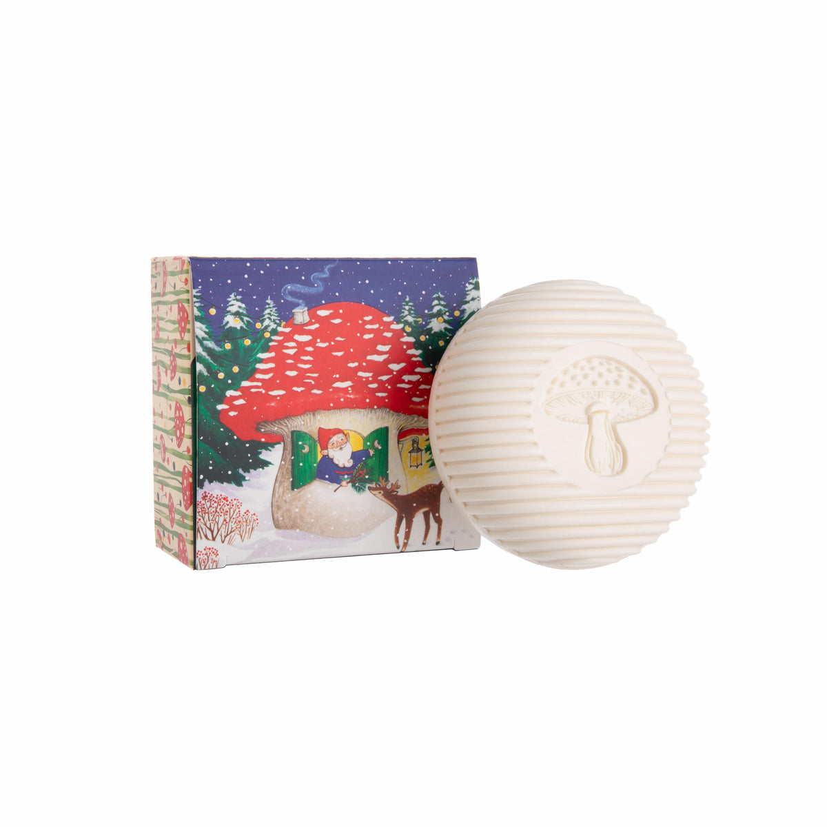 White mushroom-shaped bar soap with a colorful box featuring a Santa Claus gnome design on a white background